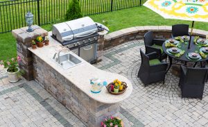 a kitchen in the backyard entertainment area