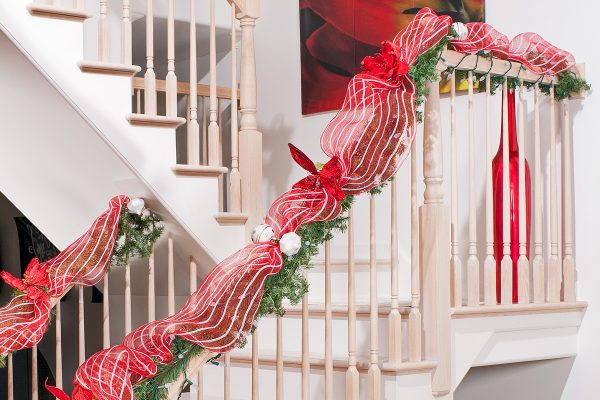 Red ribbons decorated on a staircase