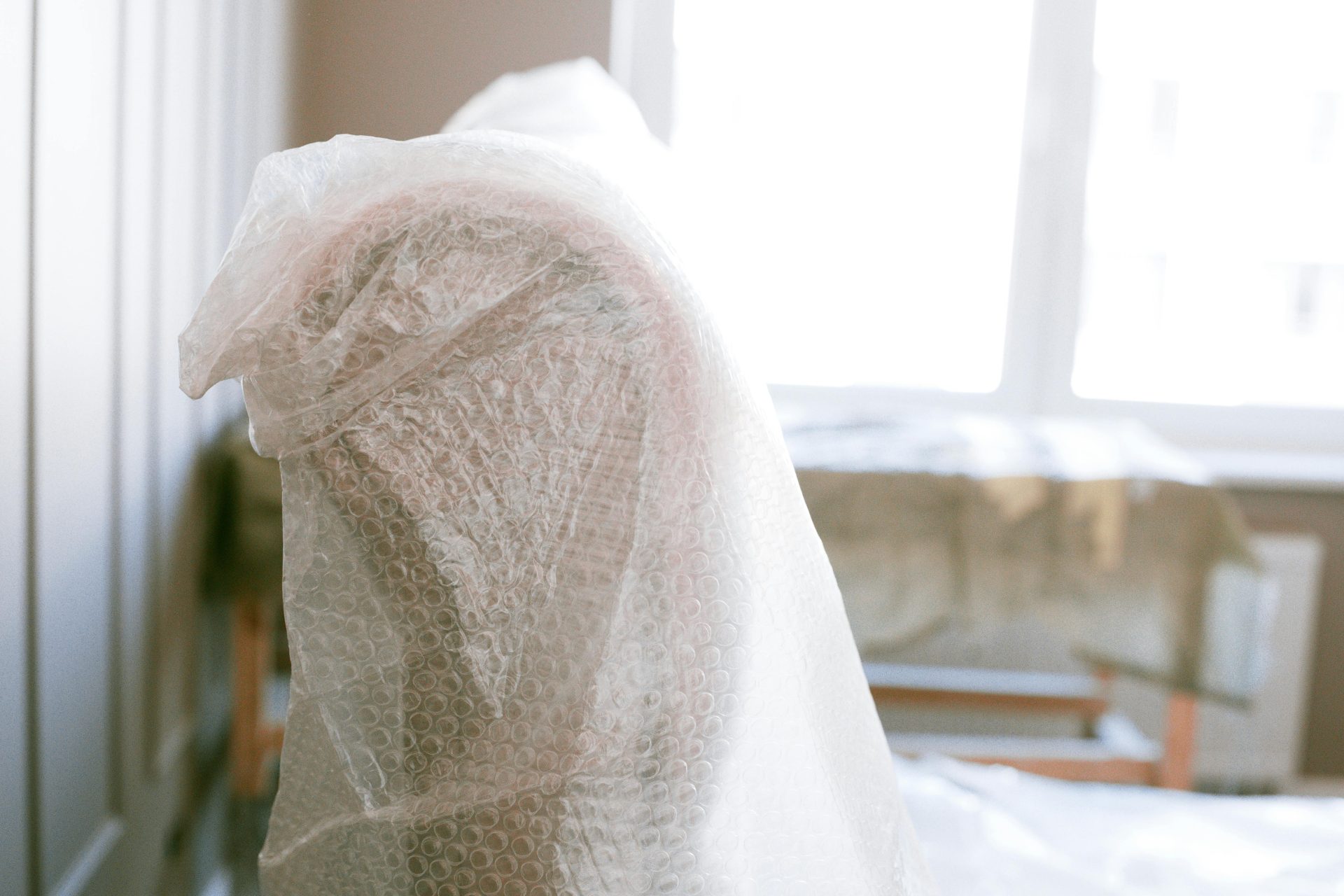 furniture wrapped in bubble wrap